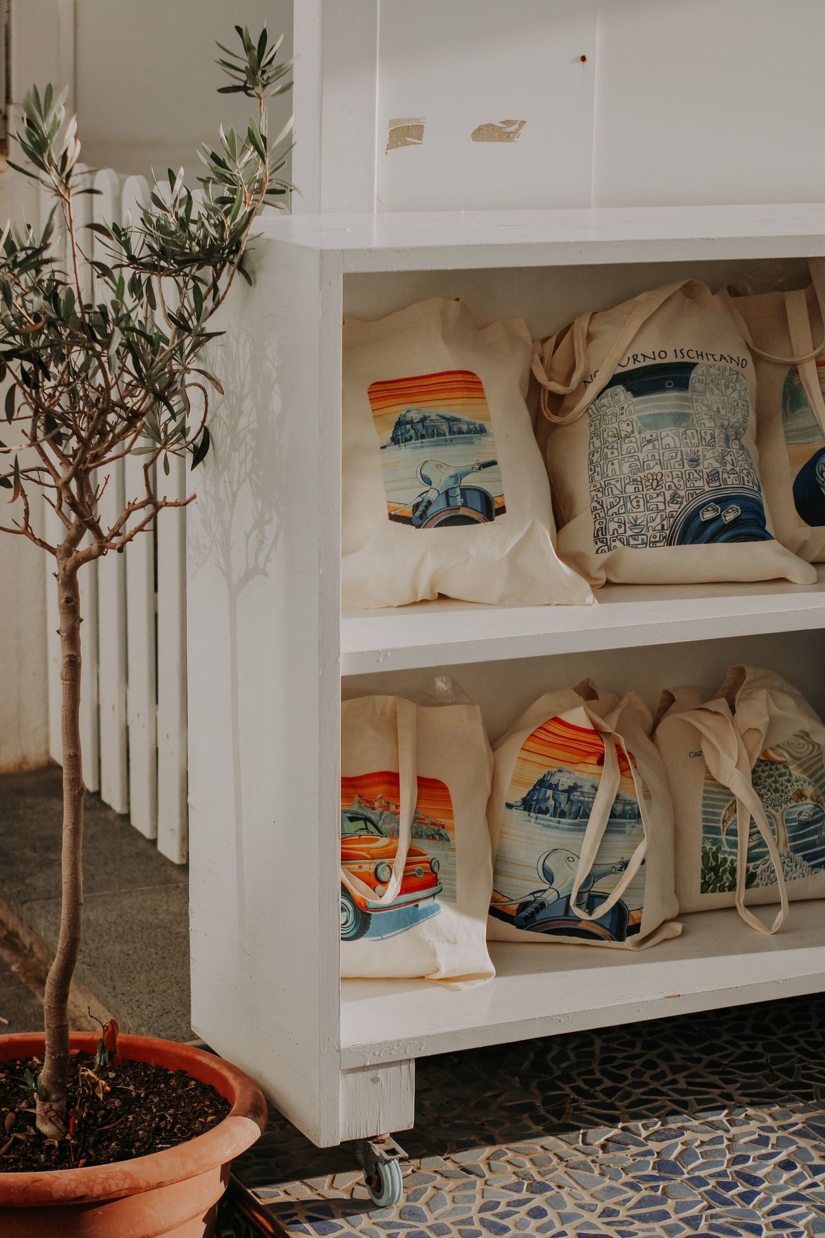 Cotton shoppers - natural and dyed. Undyed and piece-dyed cotton, flat-packed for retail display