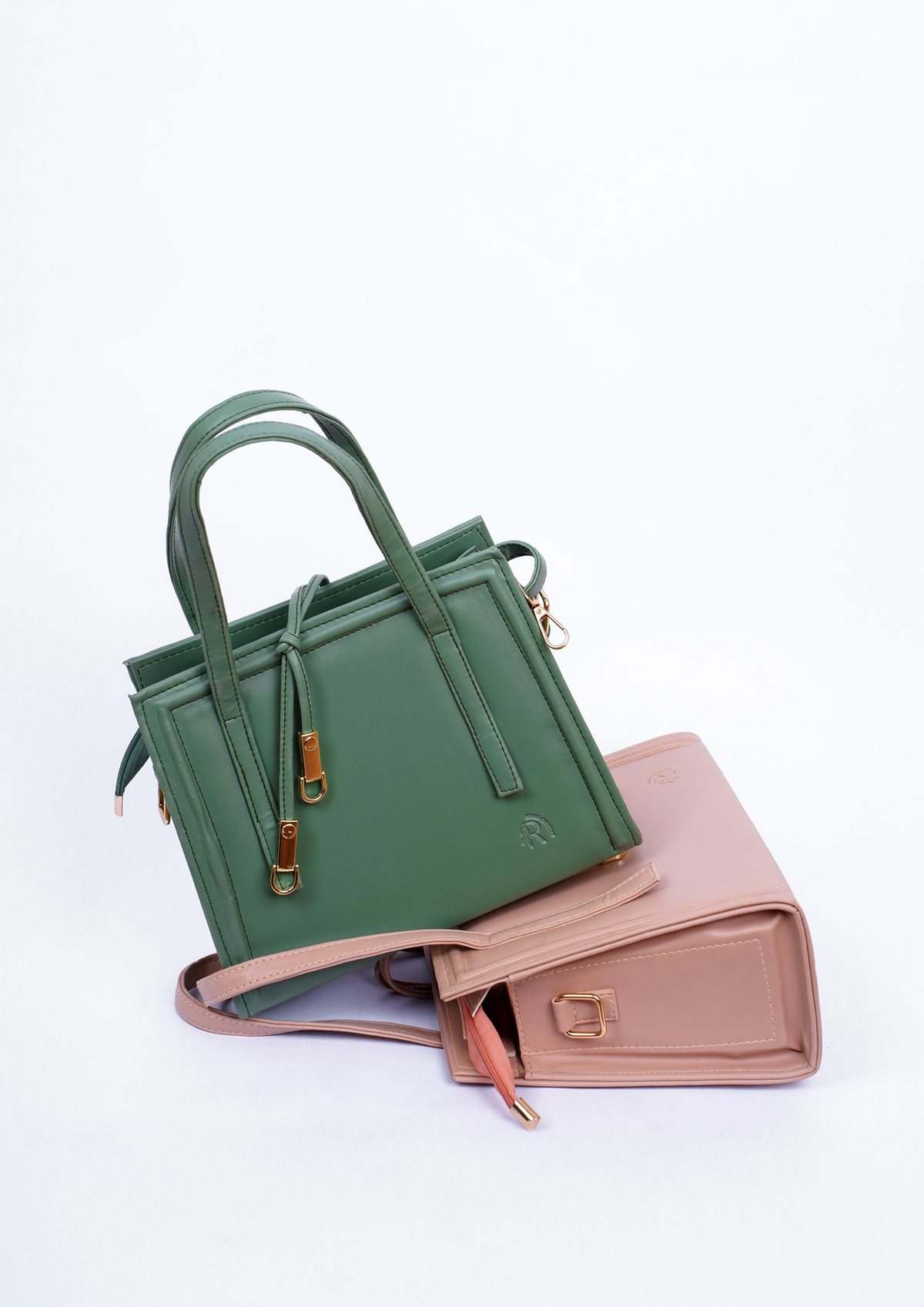 Handbags - studio, white background. PU leather, contrast stitching, structured base panel