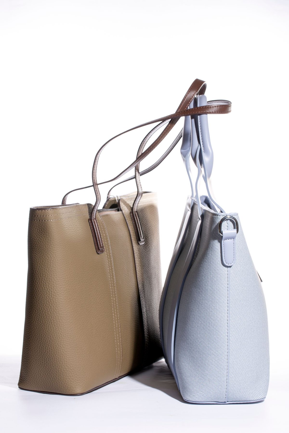 Structured handbag - flap closure. PU body, flap with magnetic snap, rigid base
